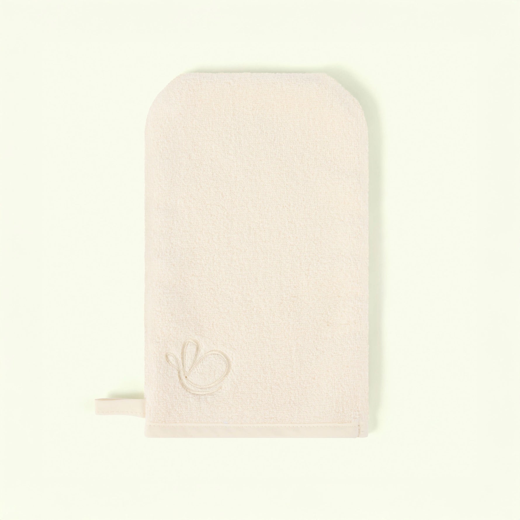 Pink pouch with a small logo on a light beige background - Love Boo UK
