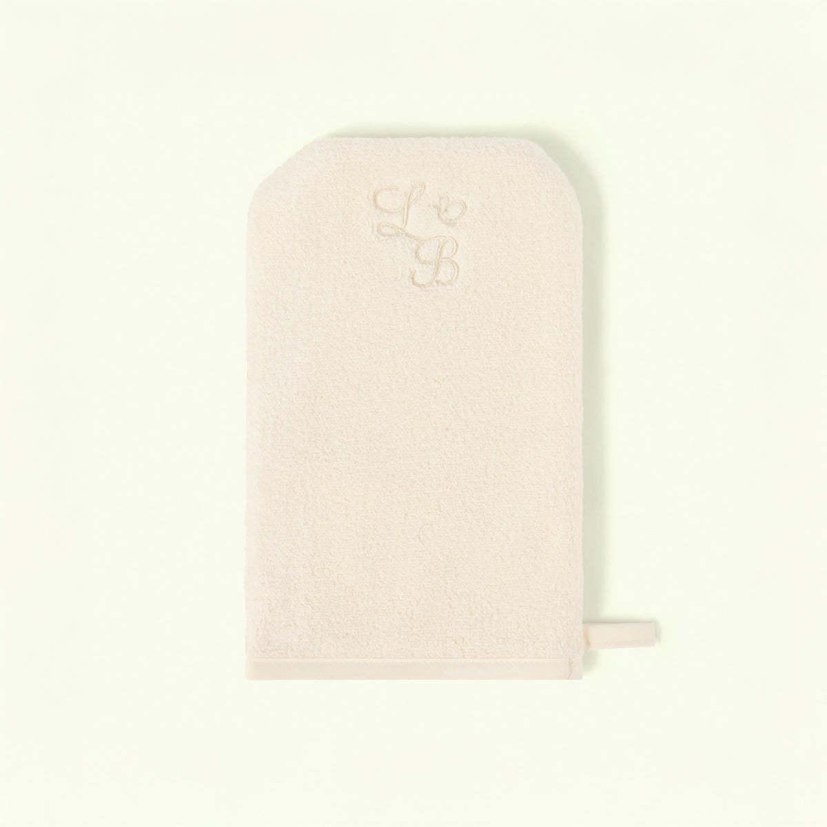 Pink pouch with a small logo on a light beige background - Love Boo UK