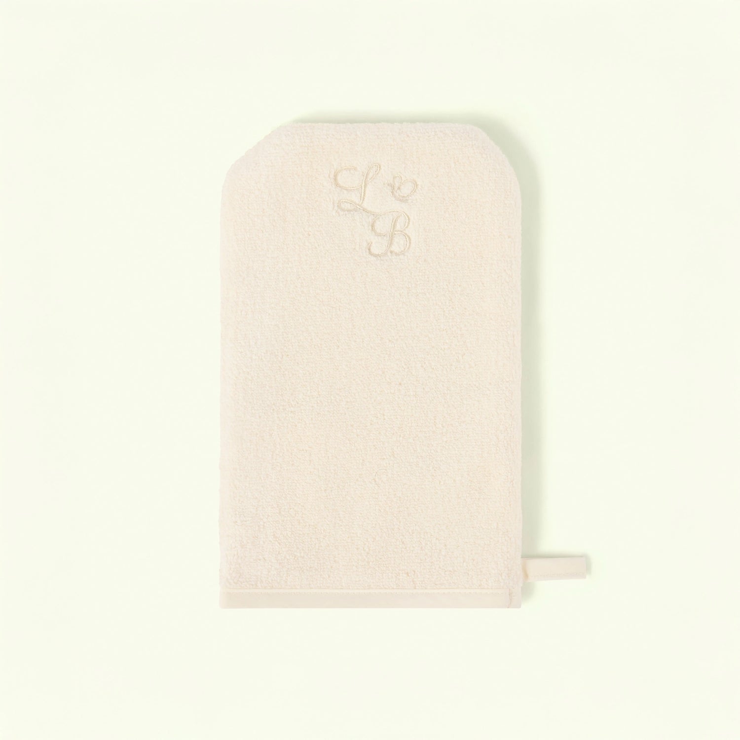 Pink pouch with a small logo on a light beige background - Love Boo UK