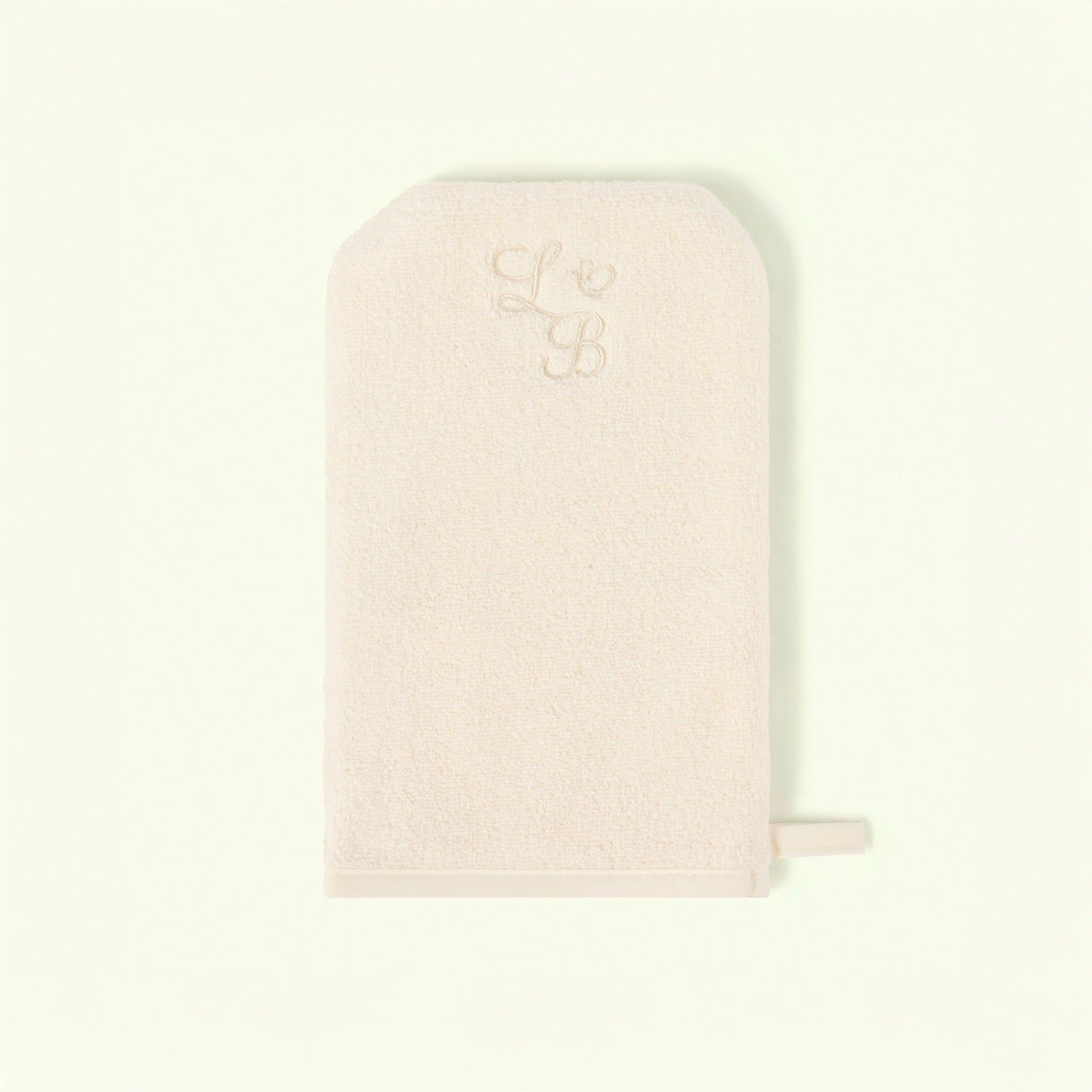 Pink pouch with a small logo on a light beige background - Love Boo UK