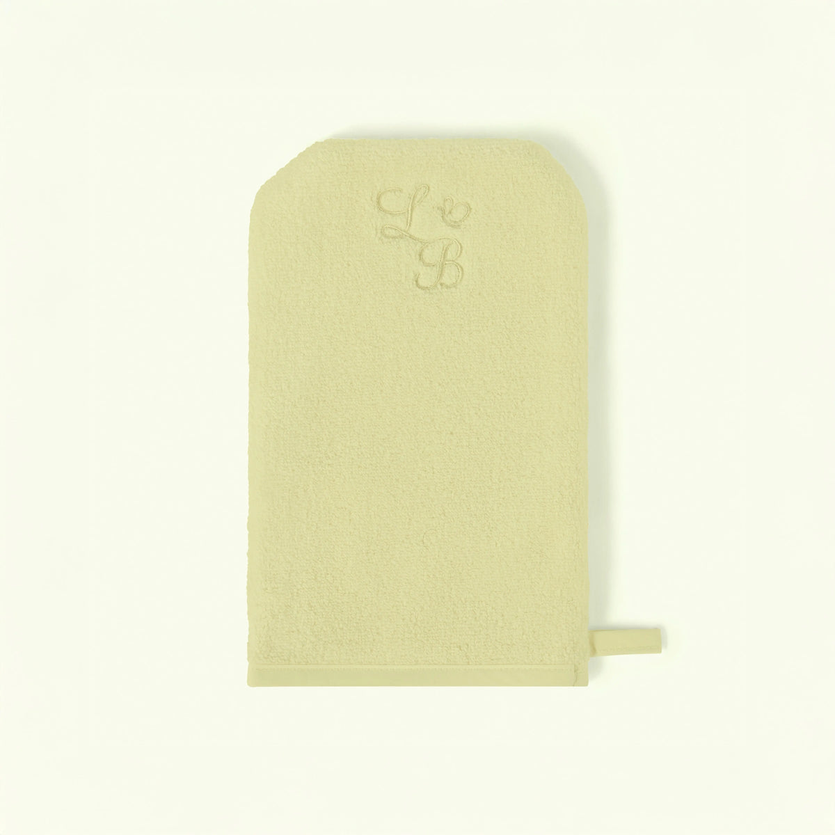 Light green fabric pouch with a small logo on a white background Love Boo UK