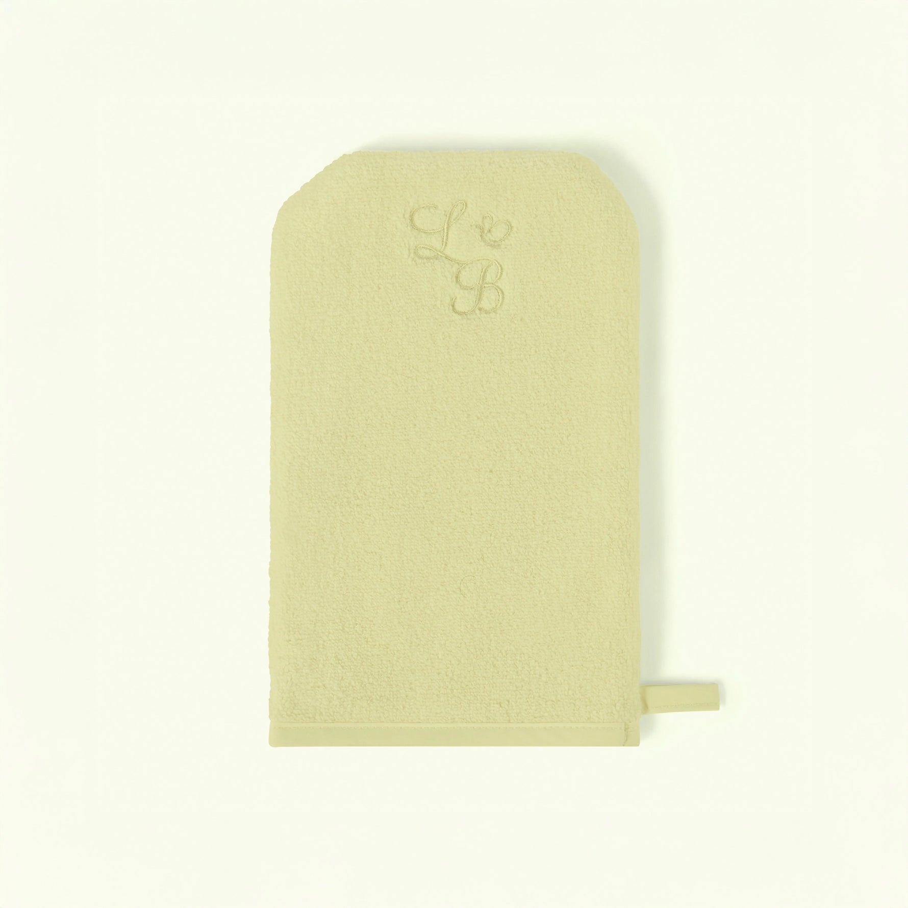 Light green fabric pouch with a small logo on a white background Love Boo UK